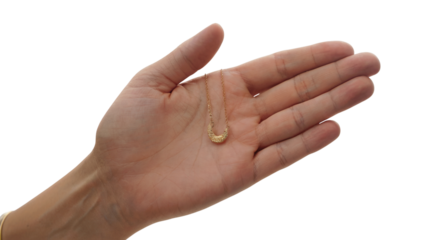 Human hand holding a hearing aid device, care concept. Isolated on transparent background, png