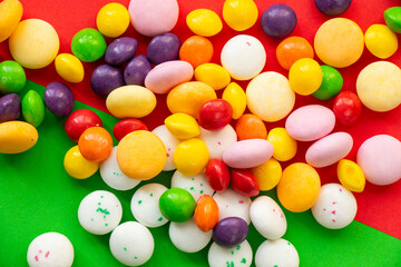 Candy on the green and red background