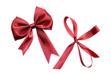 Elegant red satin bow isolated on transparent background. Red bow and crossed ribbons isolated on white background.