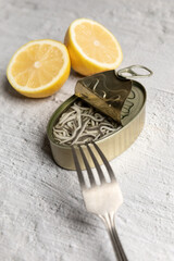 Canned elvers isolated on kitchen countertop