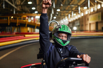 Joyful moments at the indoor karting track create lasting memories of fun and excitement © LIGHTFIELD STUDIOS