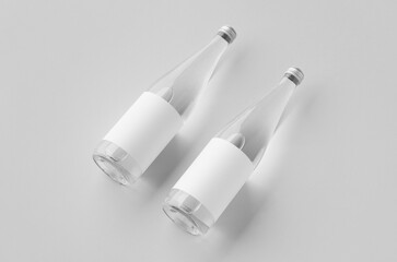 Water bottle mockup with blank label, clear glass