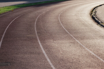 Sports surface on the stadium running track - a running and athletics area