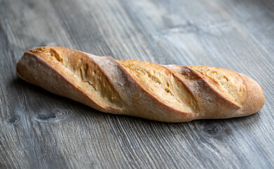 baguette bread on a wooden table 