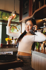 DJ Asian women young teen with music player, party sound entertainment happy smiling expression