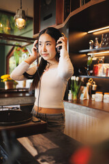 DJ Asian women young teen with music player, party sound entertainment happy smiling expression