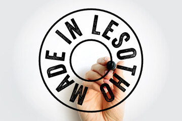 Made in Lesotho text emblem stamp, concept background