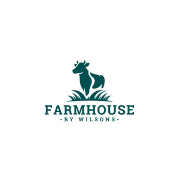 Charming farmhouse logo featuring a stylized cow and lush grass, perfect for branding a rural business or adding a touch of rustic elegance to any design