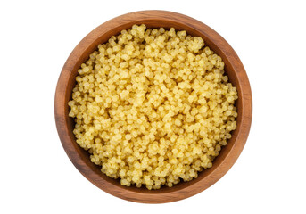 Isolated pearl couscous in a wooden bowl, small pasta beads or spheres in a bowl