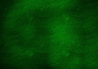 Green textured abstract background with wavy pattern 
