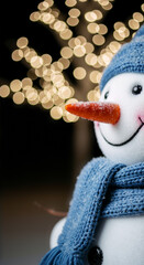 Close up snowman wearing blue hat and scarf carrot nose, festive bokeh lights background, winter holiday decoration, vertical banner copy space