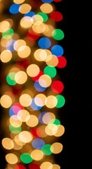 Colorful bokeh lights abstract background, festive holiday illumination. Vertical banner with copy space