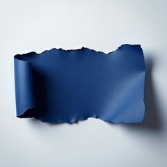 a piece of blue torn paper on white background