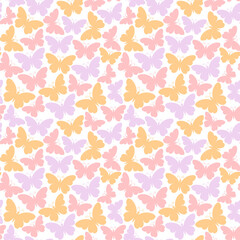 Seamless pattern with pastel butterflies in pink, yellow and lavender colors. Cute spring and summer background for fabric, wrapping paper, wallpaper and design projects.