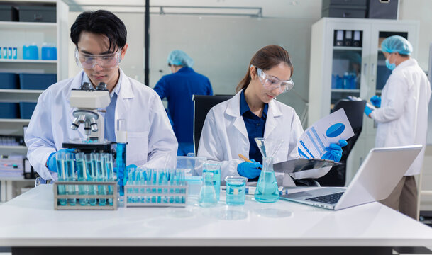 Lab work, Doctor holds a test tube takes the test from a test tube in analysis, blood, DNA, test tube stand.