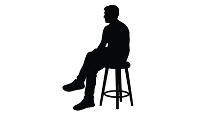 Silhouette of a man sitting on a stool