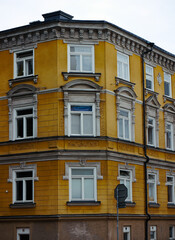Fototapeta premium View of yellow apartment building