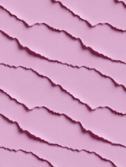 Fototapeta premium Seamless pastel pink layered paper background with torn, frayed edges. Ideal for graphic design, feminine themes, and creative projects with copy space.