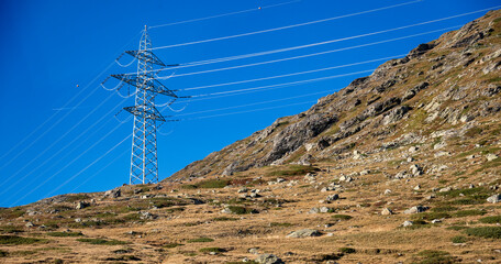 High-voltage power line on the autumnal Bernina Pass in the canton of Graub&uuml;nden, Switzerland