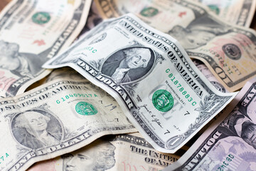 1 US dollar bill with a portrait of George Washington in close-up