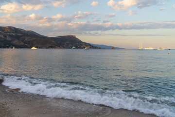 A beautiful sunset seascape of the bay at Saint-Jean-Cap-Ferrat, with luxury yachts anchored in the...