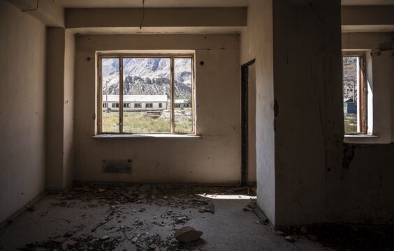 Abandoned, destroyed room in a residential building, Soviet apartment blocks, ghost town, Engilchek, Tian Shan, Kyrgyzstan