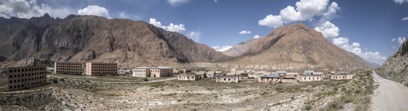 Panorama, Abandoned destroyed building in mountain landscape, Ghost town, Engilchek, Tian Shan, Kyrgyzstan
