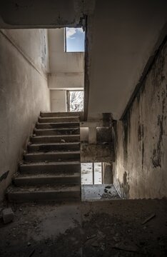 Abandoned destroyed staircase in a residential building, Soviet apartment blocks, ghost town, Engilchek, Tian Shan, Kyrgyzstan