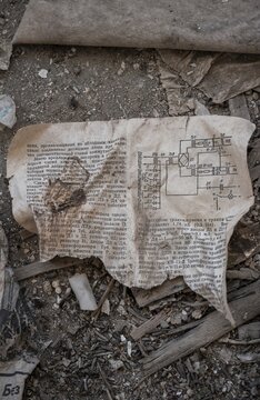 Remains of an instruction manual with circuit diagram in Cyrillic script in an abandoned building, ghost town, Engilchek, Tian Shan, Kyrgyzstan