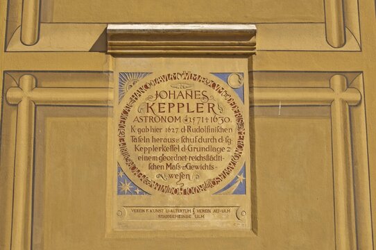 Inscription designed like a plaque: the four corners show stylised celestial bodies (sun, moon, stars and a comet), the text refers to the mathematician and astronomer Johannes Kepler, town hall, Ulm, Swabian Alb, Baden-Württemberg, Germany