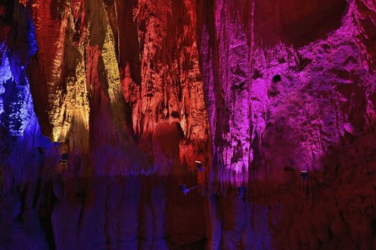Stalactites illuminated by coloured LED light, stalactite cave, Höllgrotten, Baar, Canton Zug, Switzerland