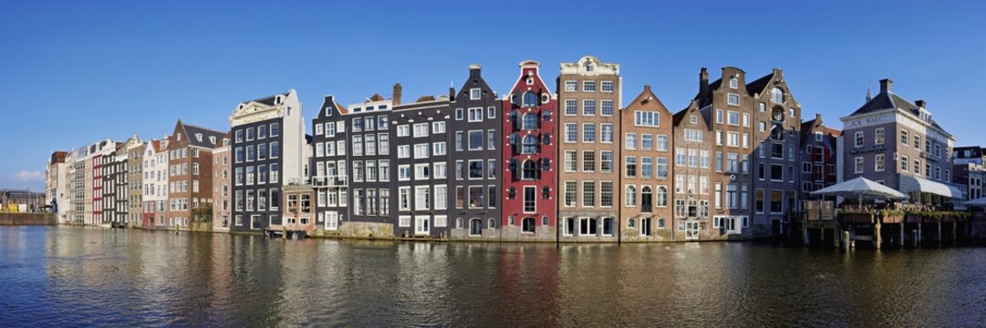 Panorama of the dancing houses, Damrak canal, Amsterdam, Province of North Holland, Netherlands