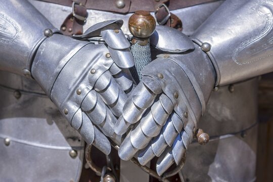 Metal gloves of a knight's armour