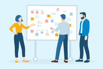 Diverse team collaborating on a flowchart or organizational chart on a whiteboard during a meeting