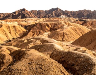 A sun-baked vista of rolling hills in shades of tan and brown, leading to a distant range of rocky mountains under a pale sky
