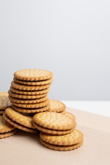Sandwich cookies, cookies with chocolate cream filling in a crust. A modern cookie and packaging concept. A sweet snack and holiday concept.
