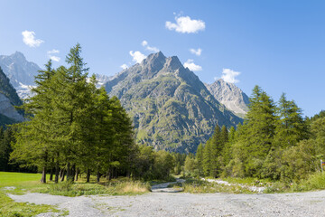 This landscape photo was taken in Europe, France, Aosta Valley, in summer. It shows the hiking path...