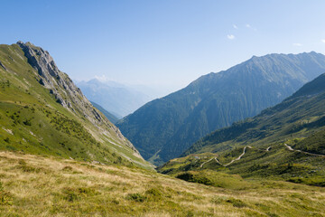 Fototapeta premium This landscape photo was taken in Europe, France, Auvergne Rhone Alpes, Haute Savoie, in summer. It shows the path of the Col de Balme, under the Sun.
