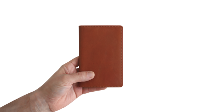 person holding a brown passport. Isolated on transparent background, png