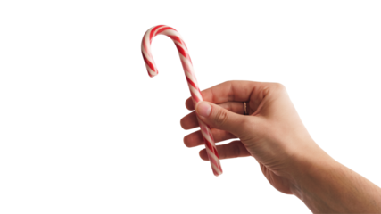 hand holding festive red and white candy cane. Isolated on transparent background, png