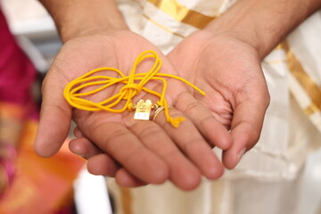 Mangalsutra or thali tying ceremony after which the couple are declared husband and Wife in India.indian traditional wedding