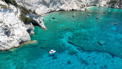 Aerial drone photo of tropical Caribbean island fjord shaped paradise bay with white rock arch...
