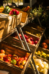Fresh vegetables at small local urban market. Organic produce on sale at outdoor farmer market. Selling fresh crops and veggies harvest. European urban setting. Close up. Part of the series