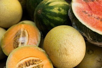 Fresh vegetables at small local urban market. Organic produce on sale at outdoor farmer market. Selling fresh crops and veggies harvest. European urban setting. Close up. Part of the series