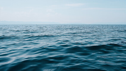 Obraz premium Calm Tranquility of the Vast Ocean Waves and Blue Sky