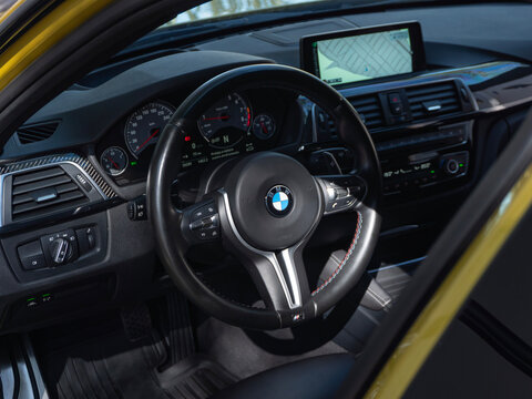 BMW M3 F80 interior cockpit and dashboard, German performance sedan driver environment

