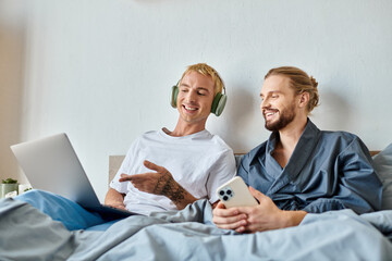 Fototapeta premium Gay couple enjoys cozy time together after a romantic date filled with joy and connection