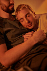Fototapeta premium Warm embrace between a couple sharing a tender moment after their romantic date night