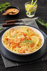 yummy spaghetti with shrimps in a white bowl