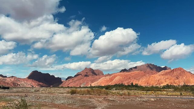 time-lapse video of white clouds over the rocky mountains in Tianshan Mysterious Canyon, Xinjiang, China